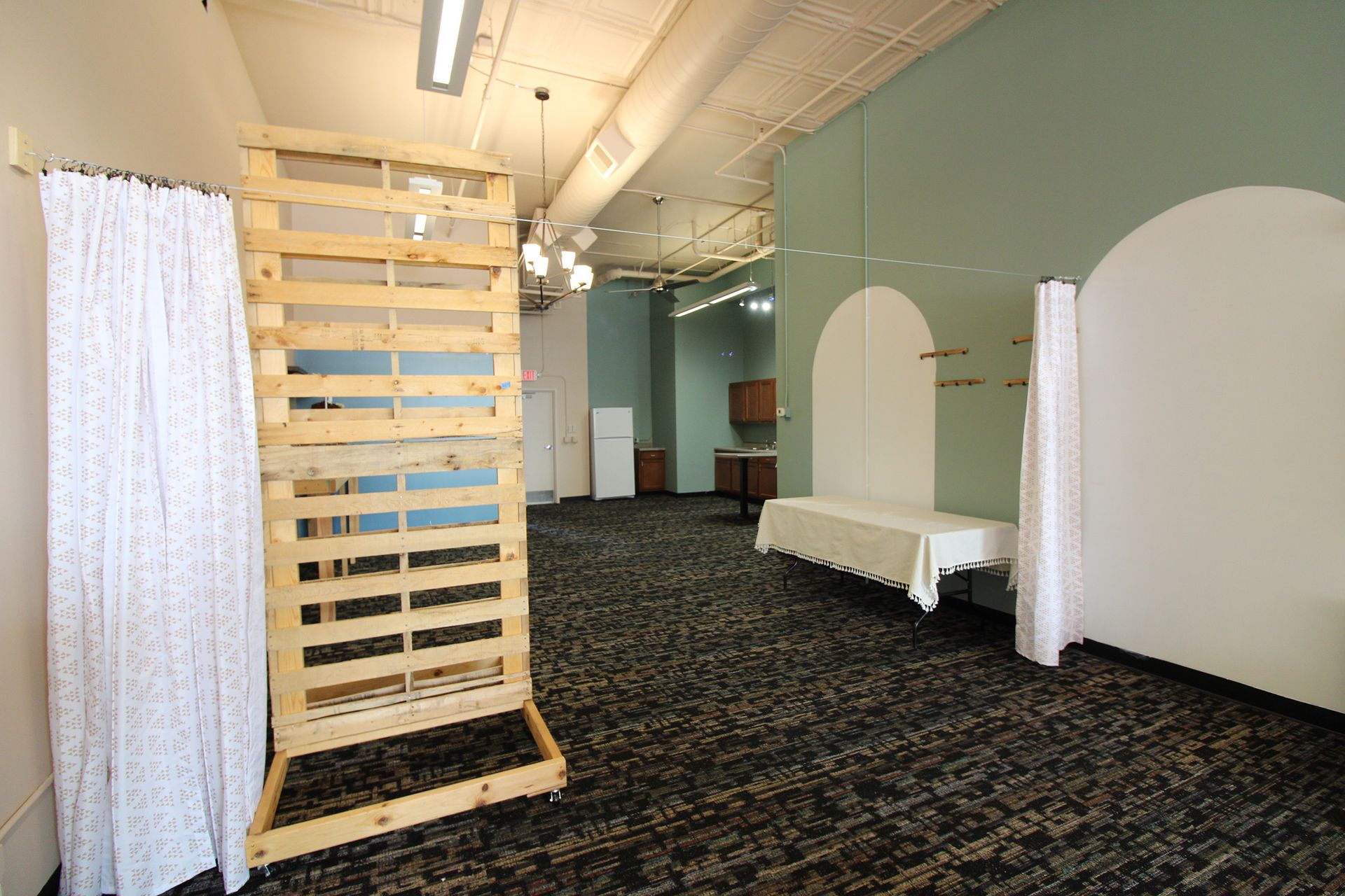 there is a wooden pallet in the middle of the room