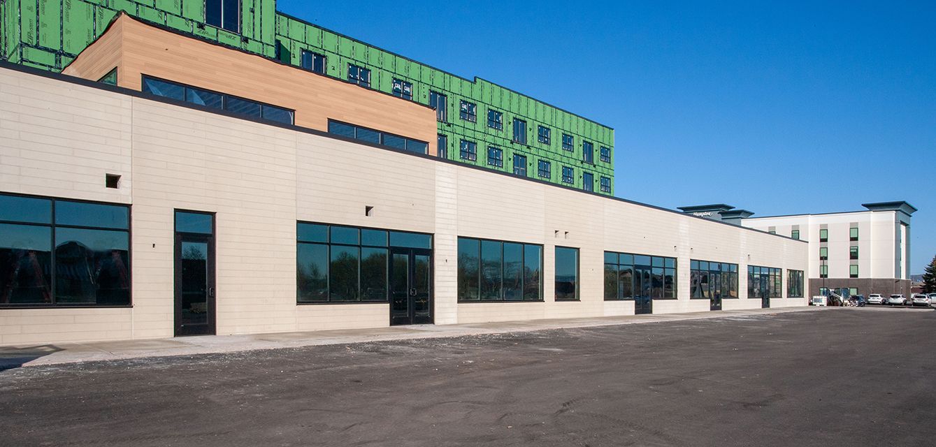 a large building under construction with a lot of windows