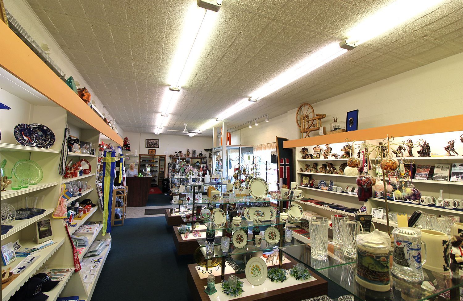 a store filled with lots of shelves and displays