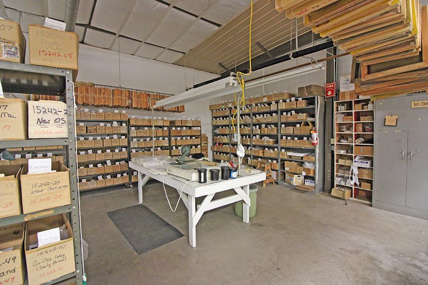 a large room with lots of shelves and boxes on them