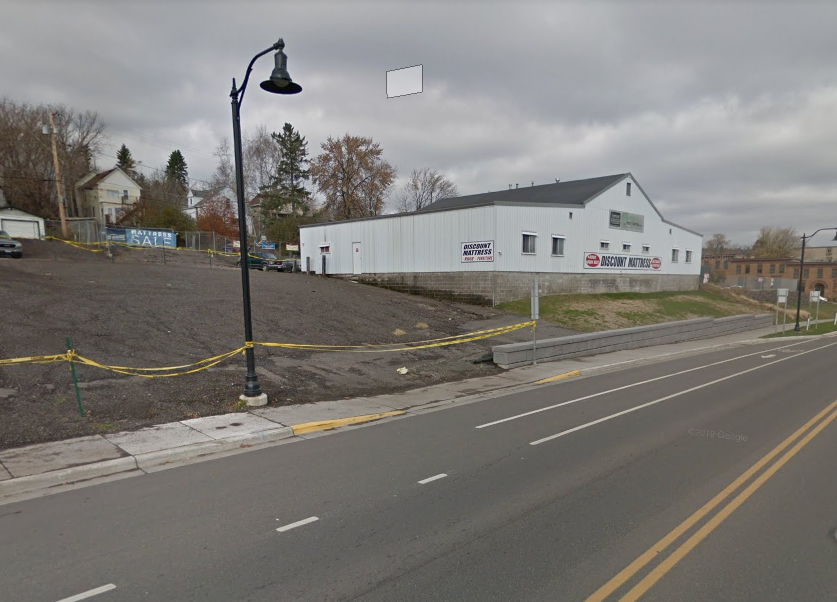 a white building with a sign