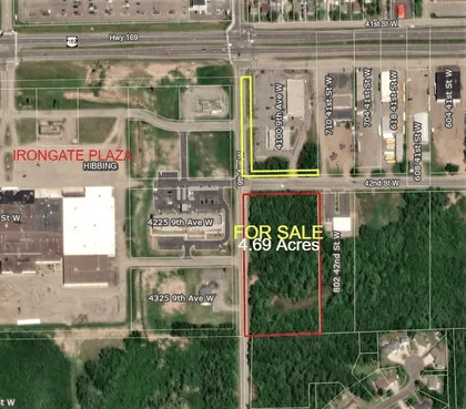 Aerial map of a commercial lot outlined in red, labeled “FOR SALE 4.69 Acres,” near Iron Gate Plaza.