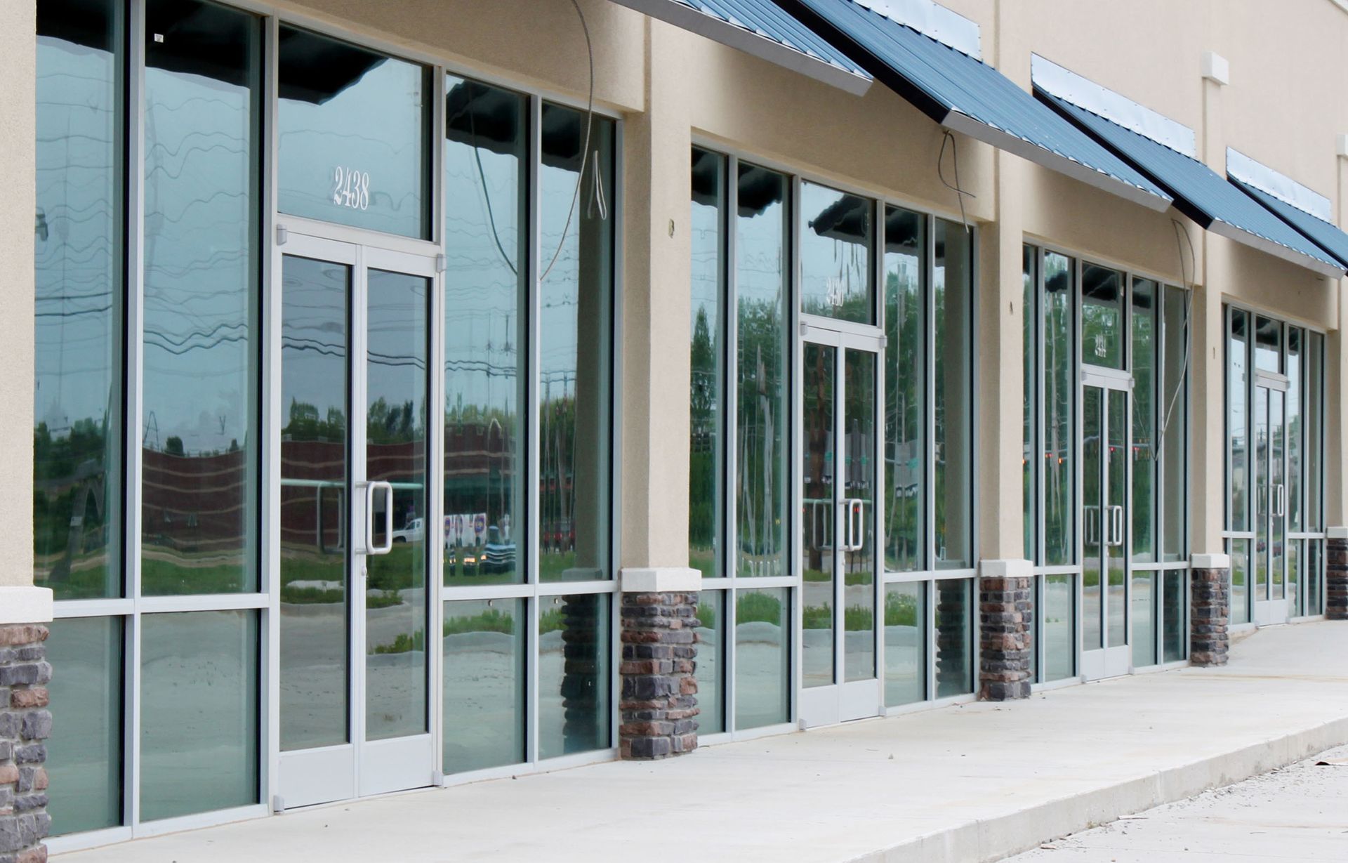 a large building with a lot of windows and doors