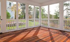 Wooden deck with white enclosed porch