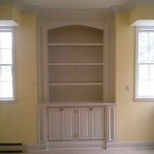 Built-ins in a house with yellow walls