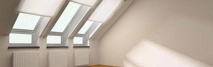 Remodeled attic with skylight windows