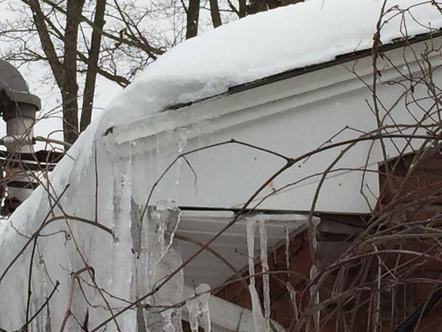 Huge icicles forming around the gutters and eaves