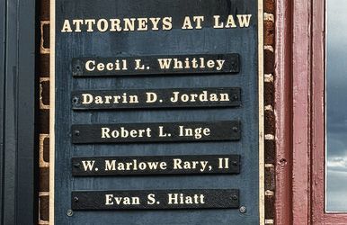 A sign that says attorneys at law on it