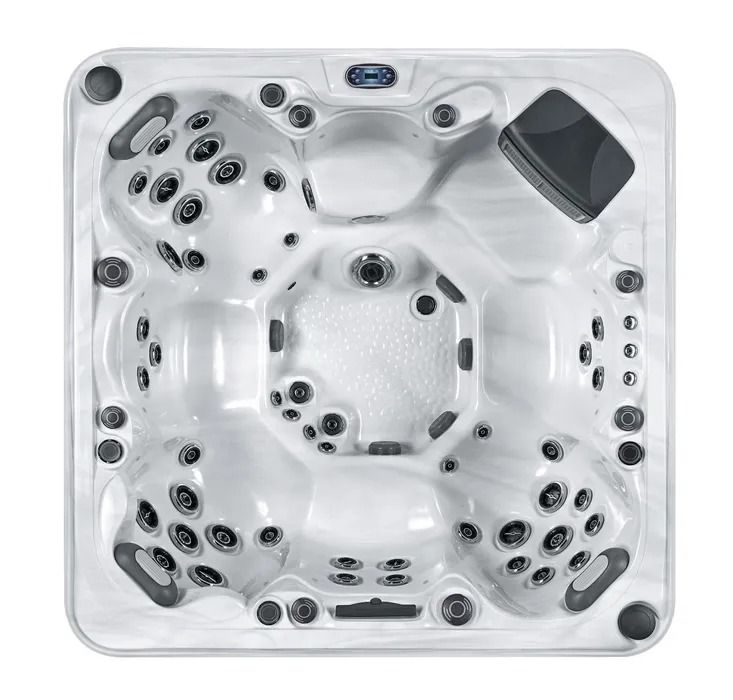 Top-down view of a white square hot tub with multiple black jets and seats