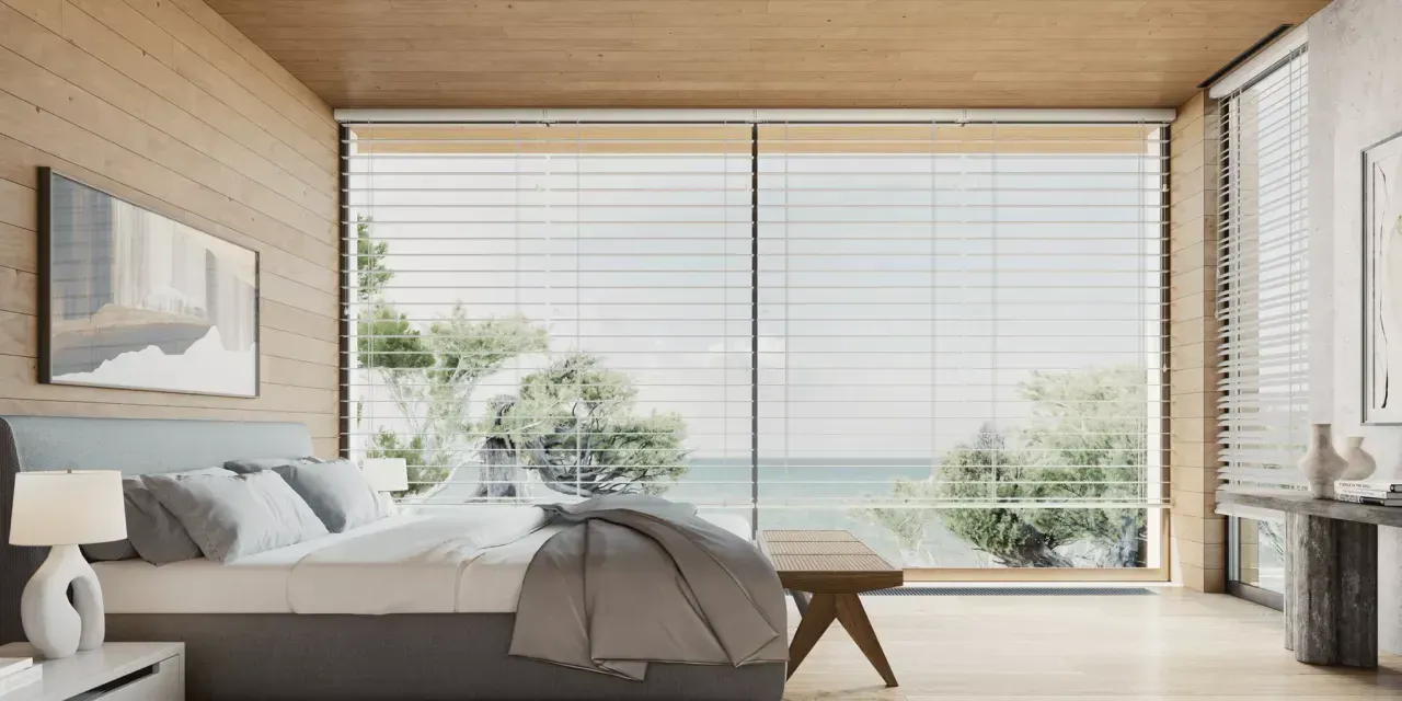 Bedroom with a large window overlooking the ocean. The room has wood paneling and light-colored bedding.