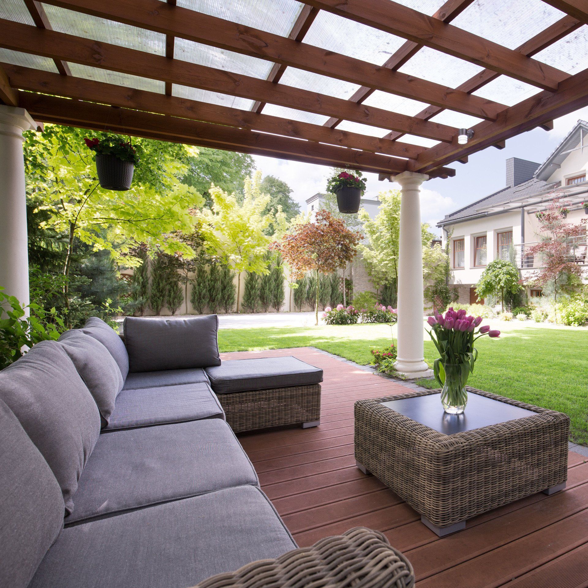 Modern chairs and table with pergola