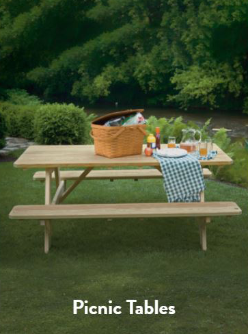 A picnic table with food on top