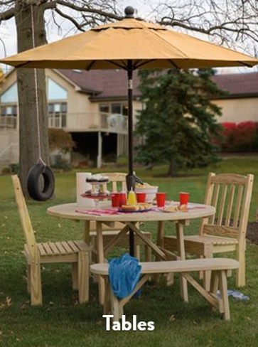 Chairs and table made of wood at the garden