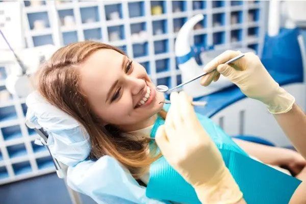 Nicole E. Kuske, DDS