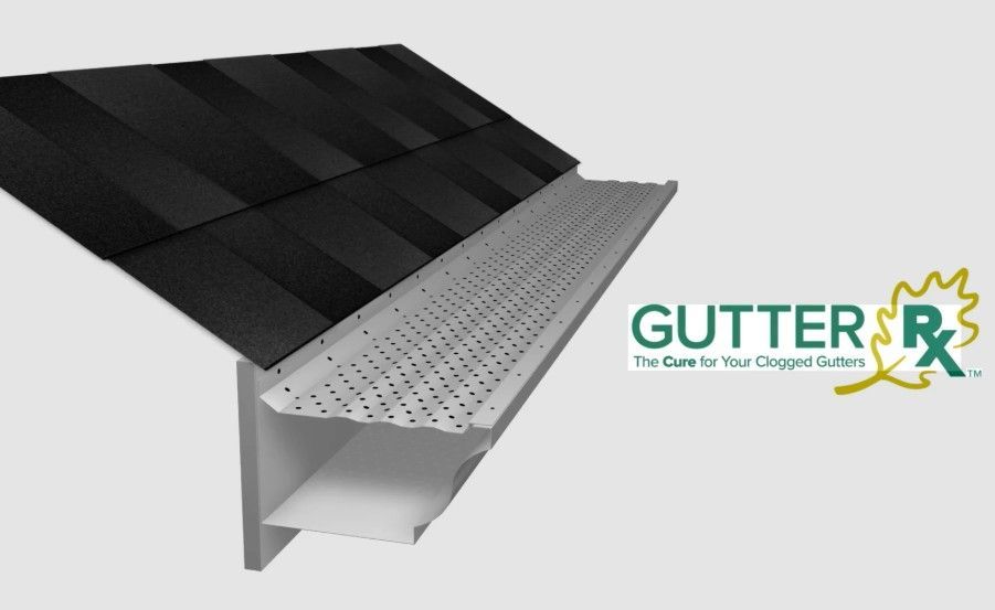 GutterRx gutter guard system installed on a roof. White perforated guard and gutter with black shingles.