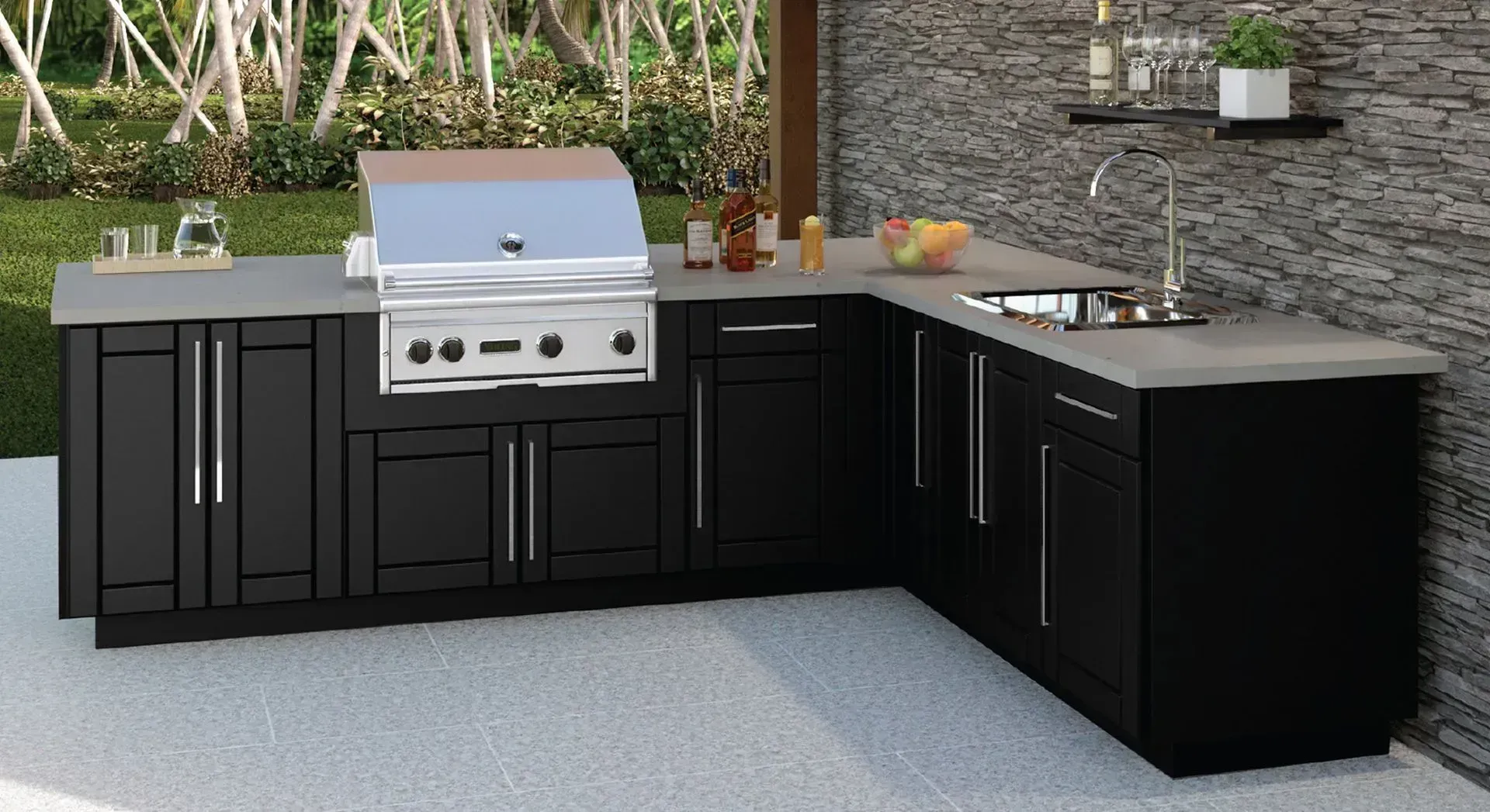 Outdoor black kitchen with grill, sink, and countertops.