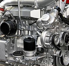 A close up of an engine with a lot of parts.