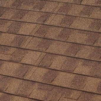 Brown asphalt shingle roof.