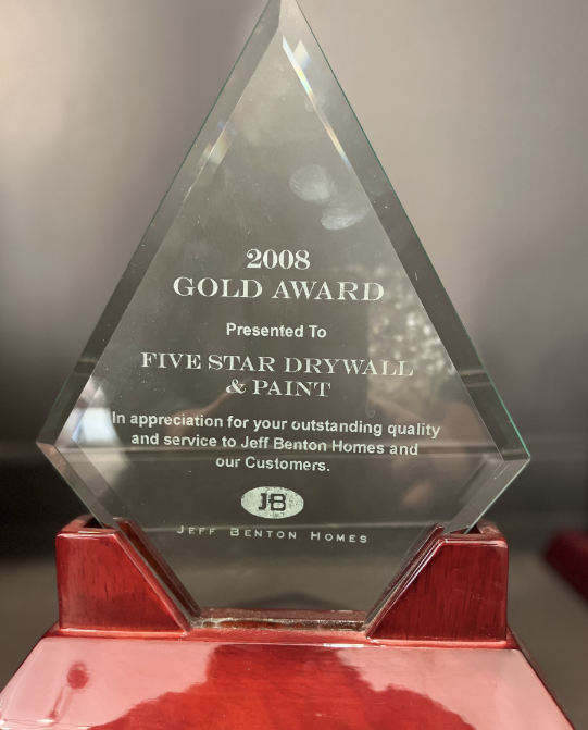 A 2008 gold award presented to five star drywall and paint