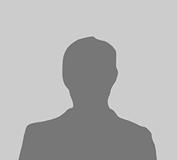 A silhouette of a man without a face on a gray background.