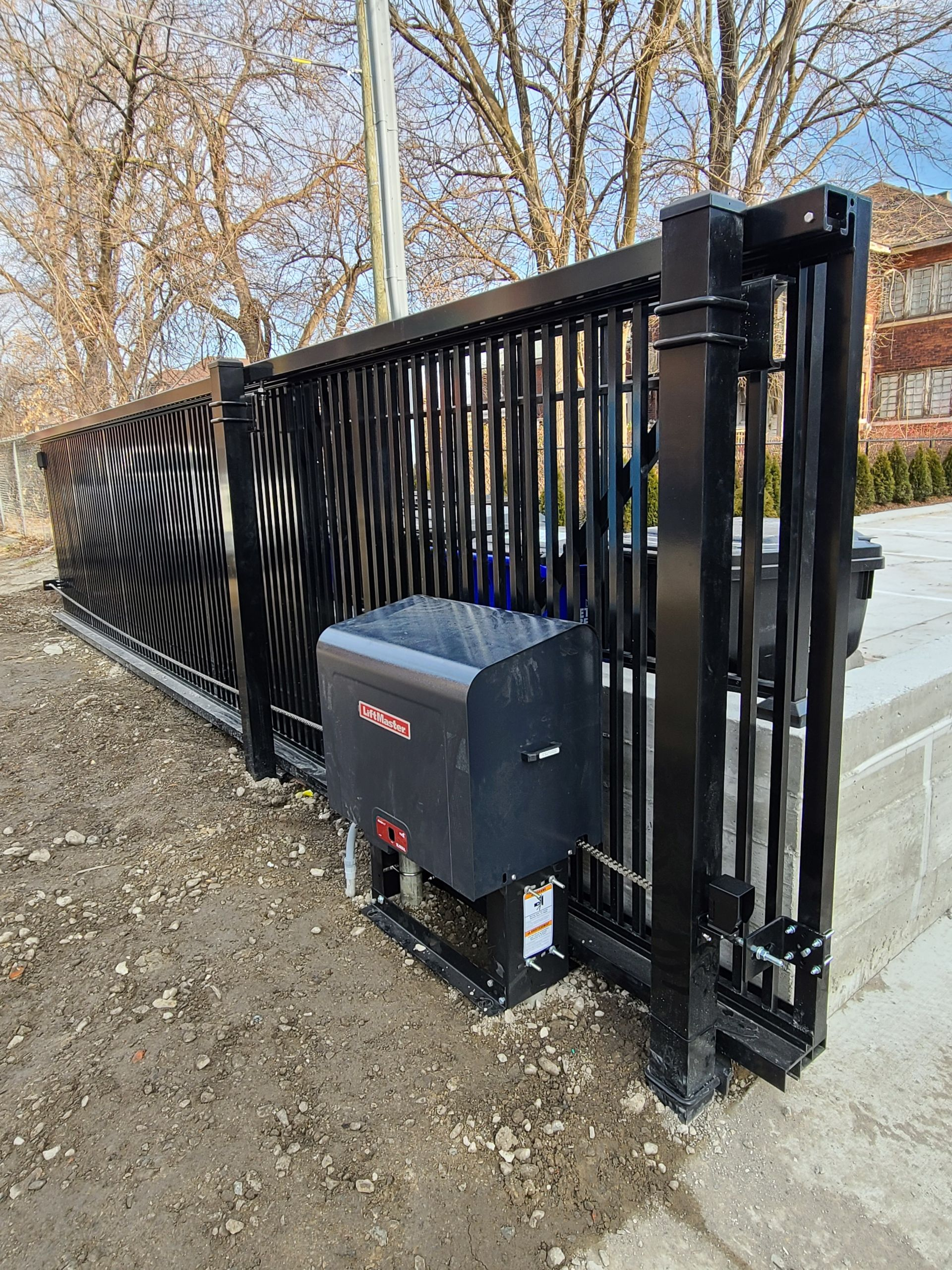 Automatic gate operator and access control system installed by Eastside Fence