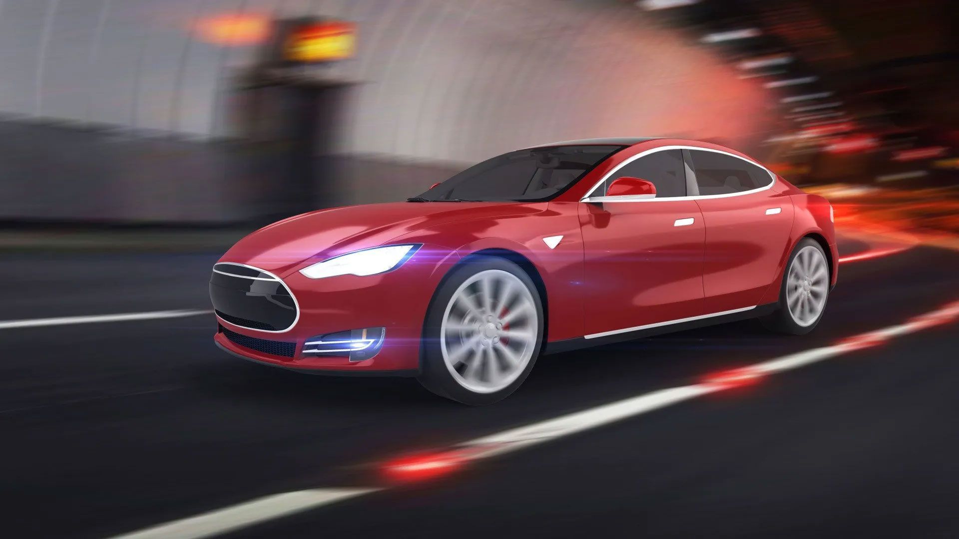 A red tesla model s is driving through a tunnel.