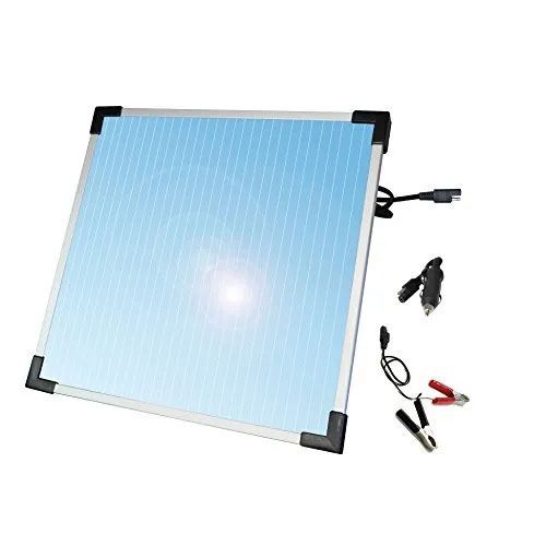 A solar panel is sitting on top of a white surface.