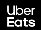 The uber eats logo is white on a black background.