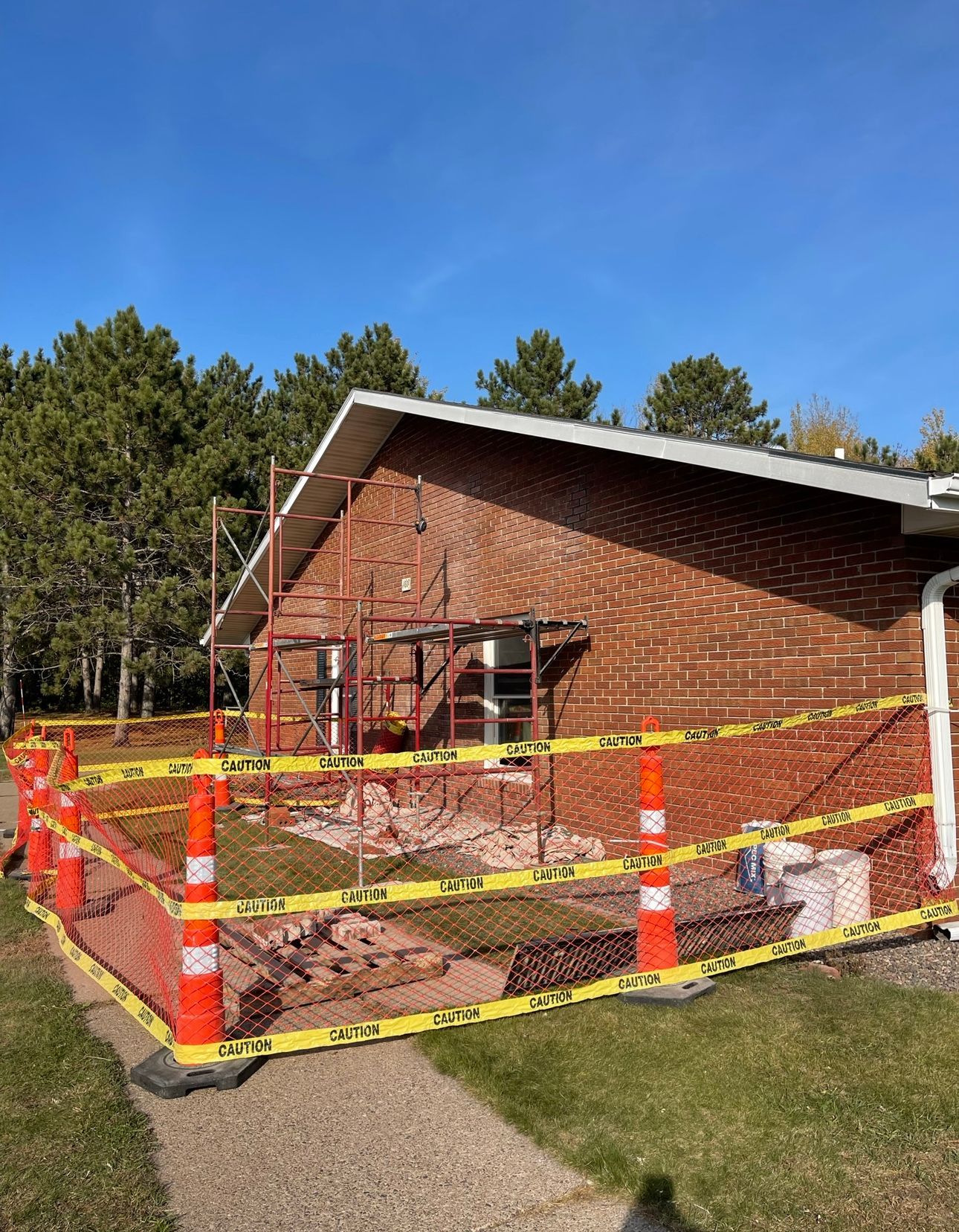 A brick house is being remodeled