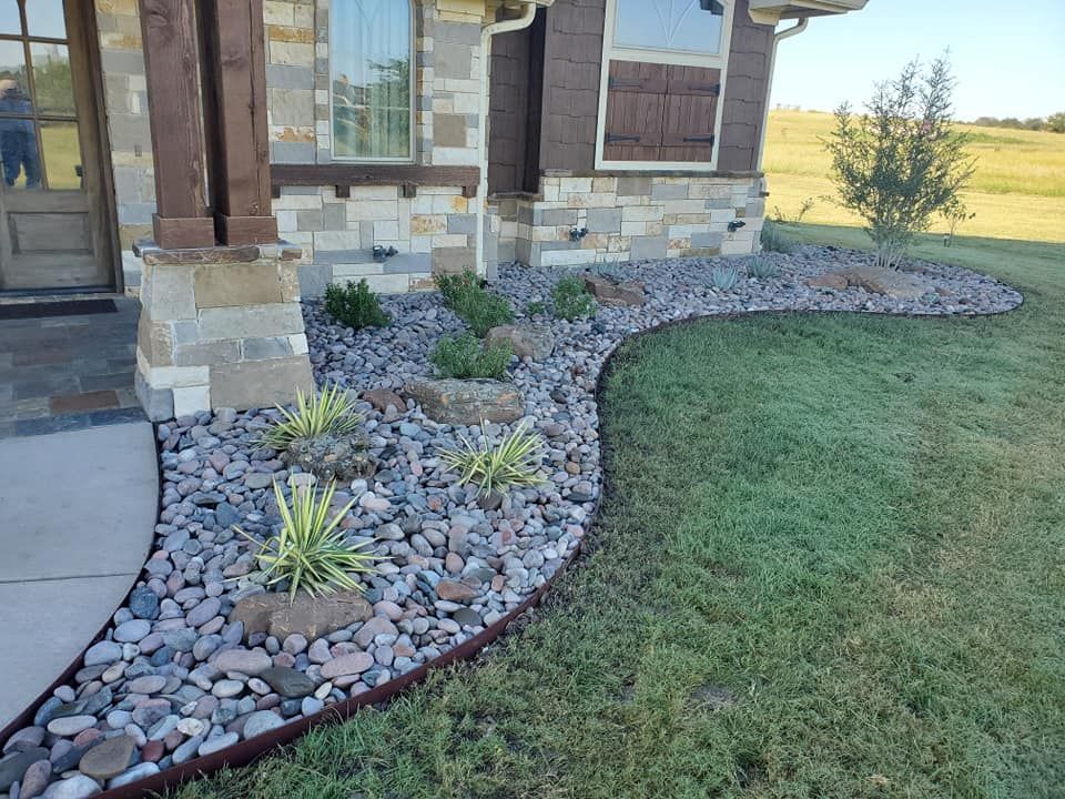 Pebbles in side garden