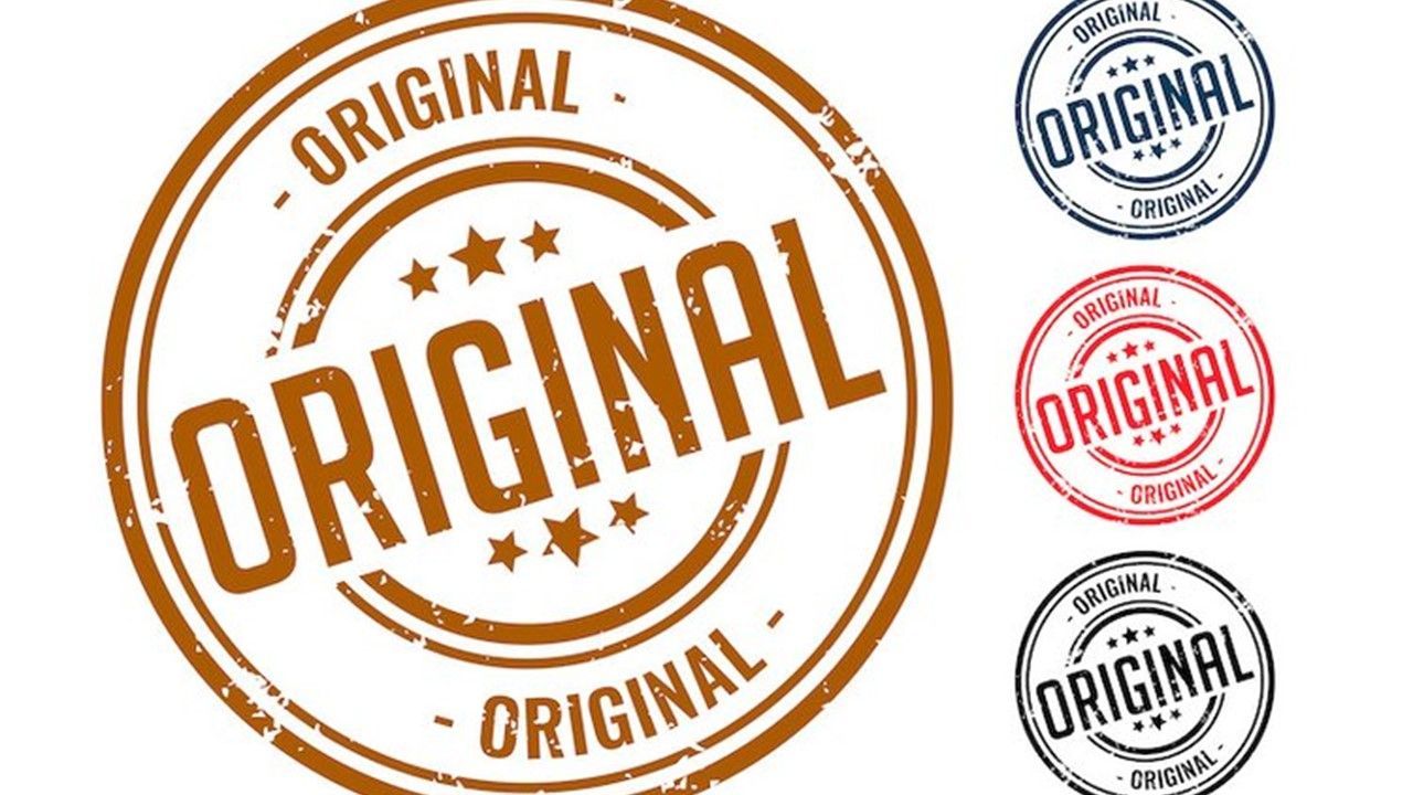 A stamp that says original on it in different colors