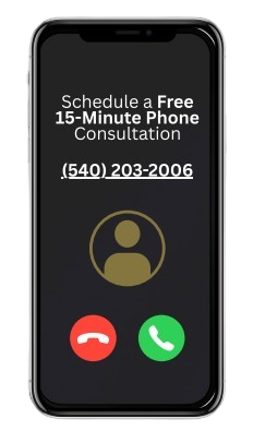 A cell phone with the words,  schedule a free 15-minute phone consultation on it.