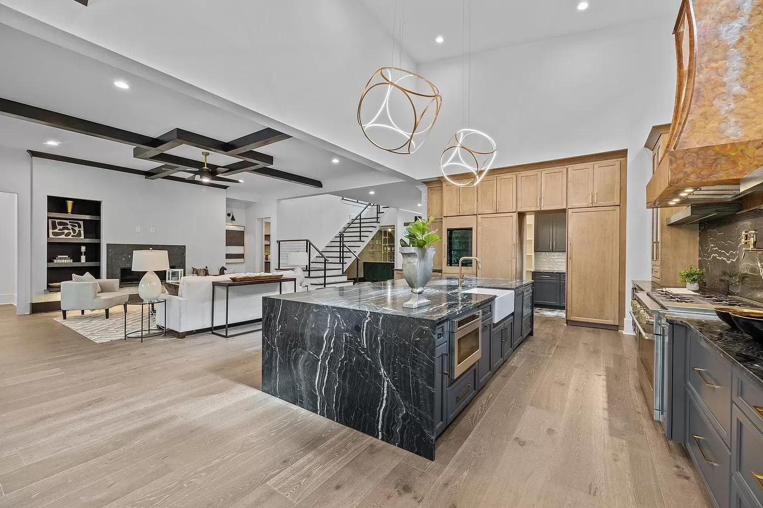 There is a large island in the middle of the kitchen.