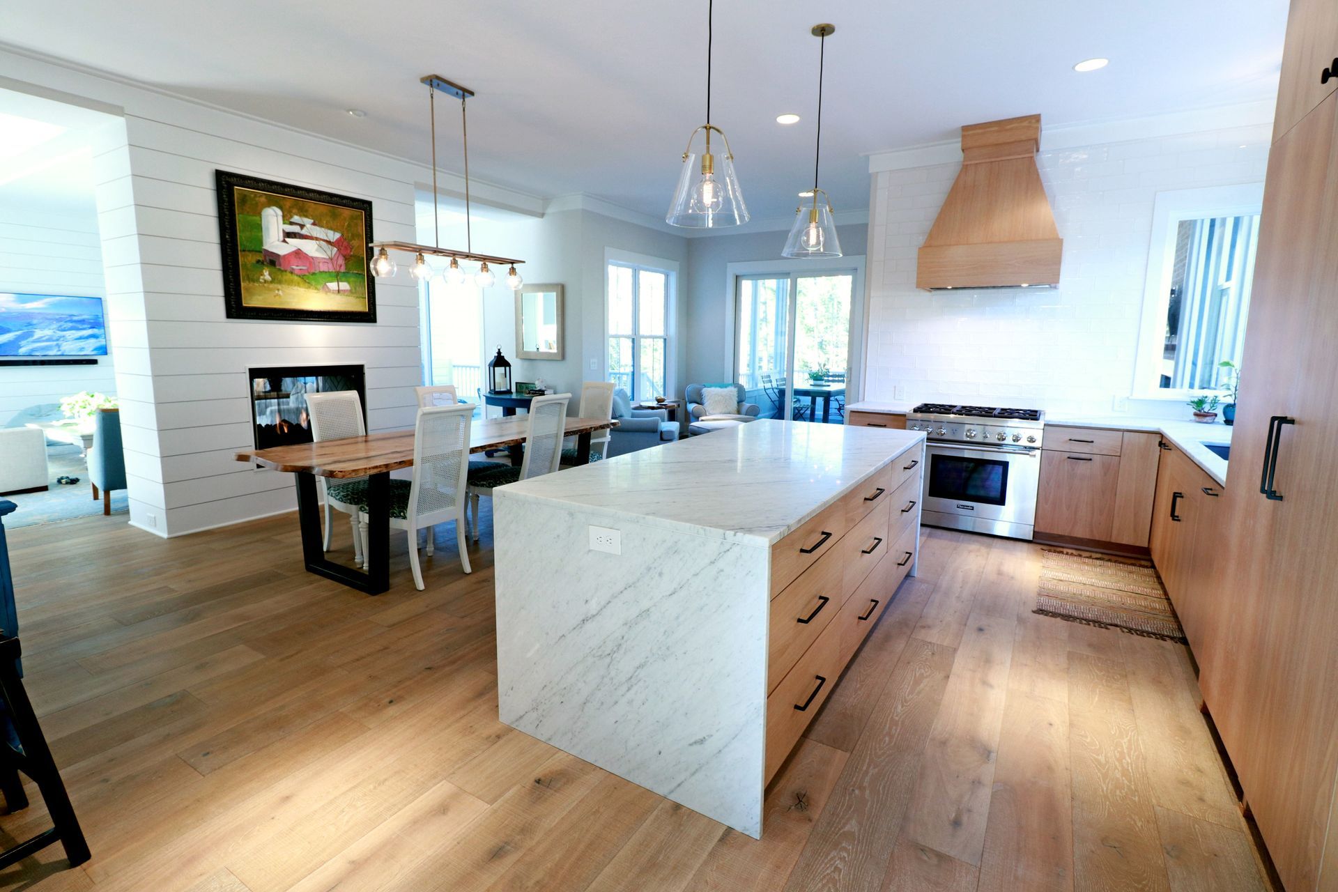 A kitchen with a large island in the middle of it