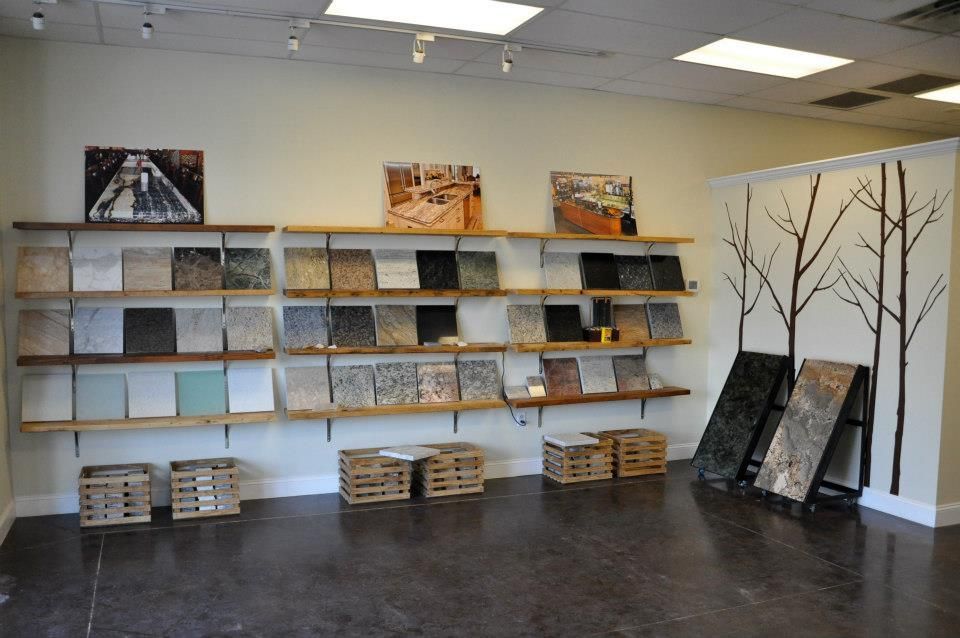 A room with shelves filled with different types of tiles