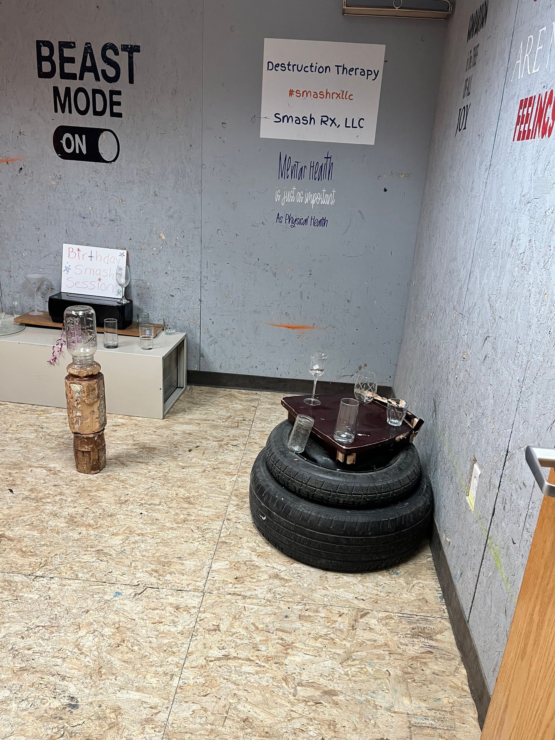 A room with a sign that says `` beast mode '' on the wall.