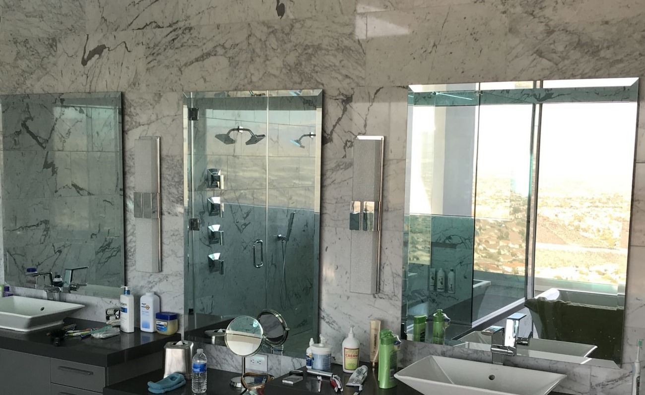 Bathroom mirror with frame