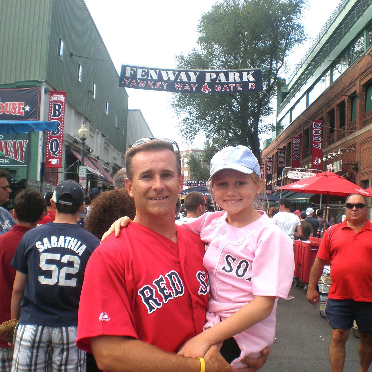 Dan Wood with his child at the Fenway Park