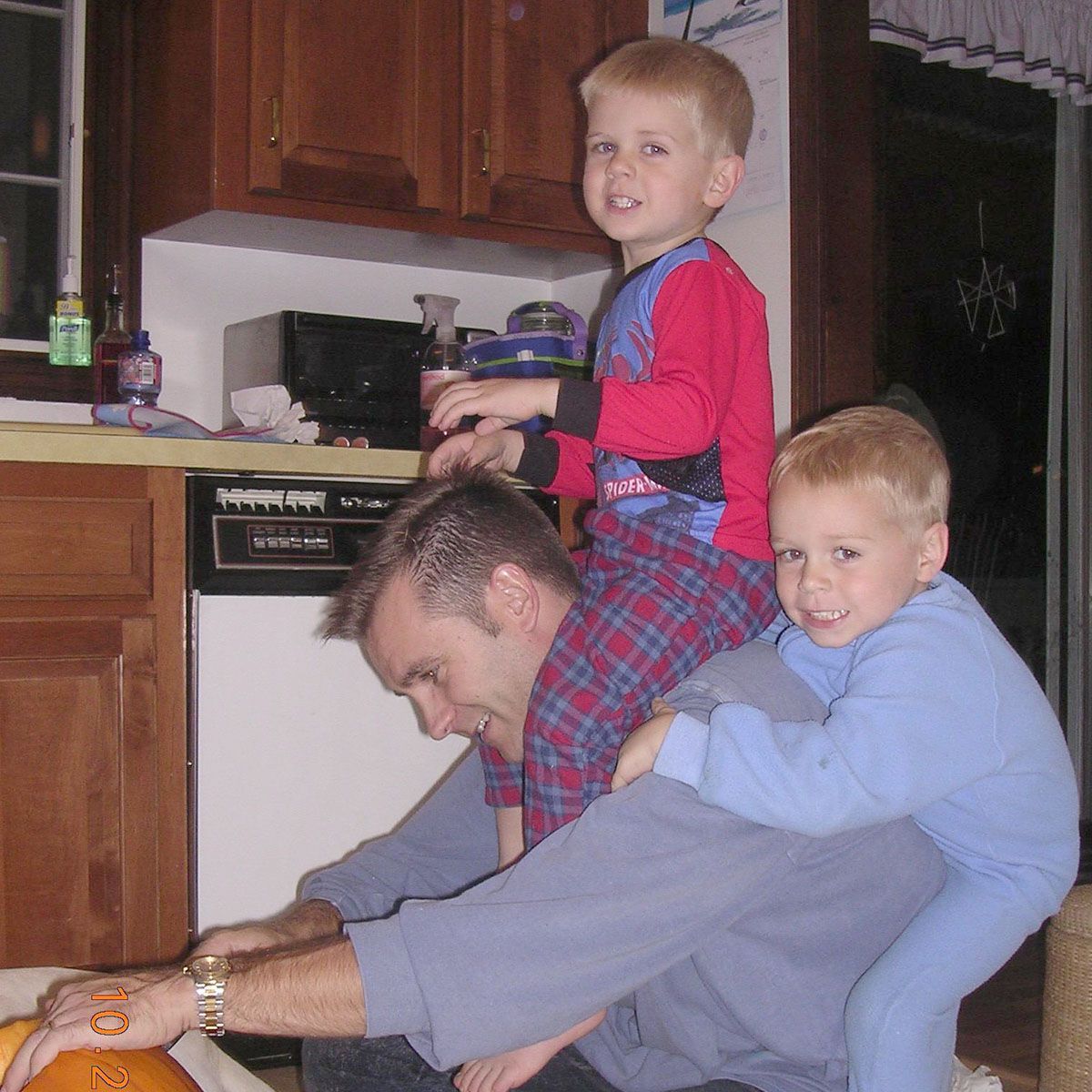 Dan Wood playing with his sons