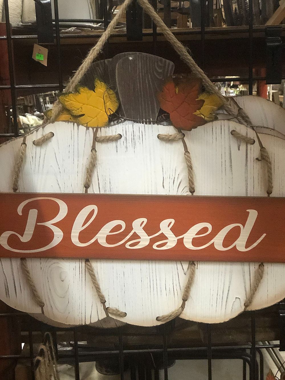 Wooden pumpkin-shaped sign, white with