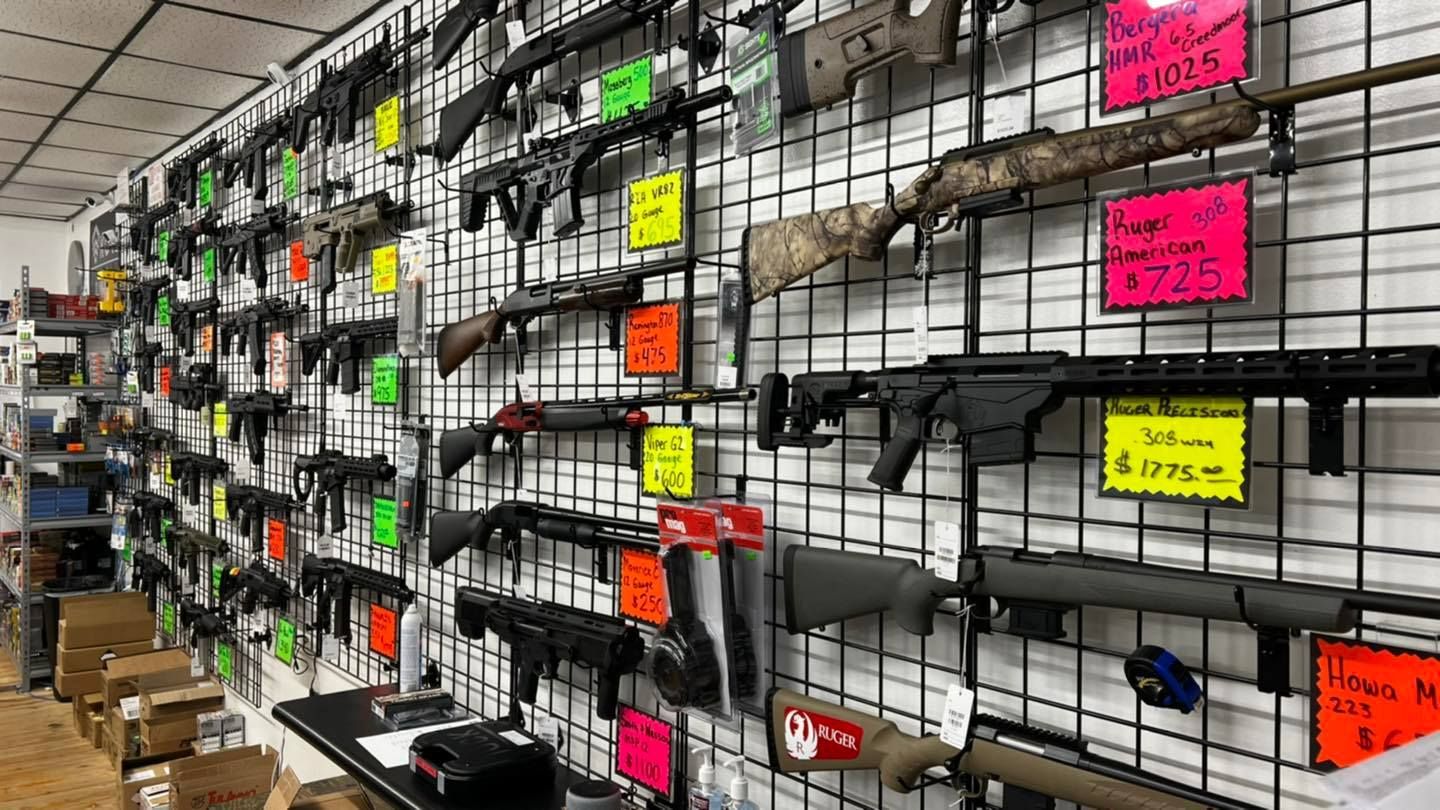 Rifles and guns are displayed