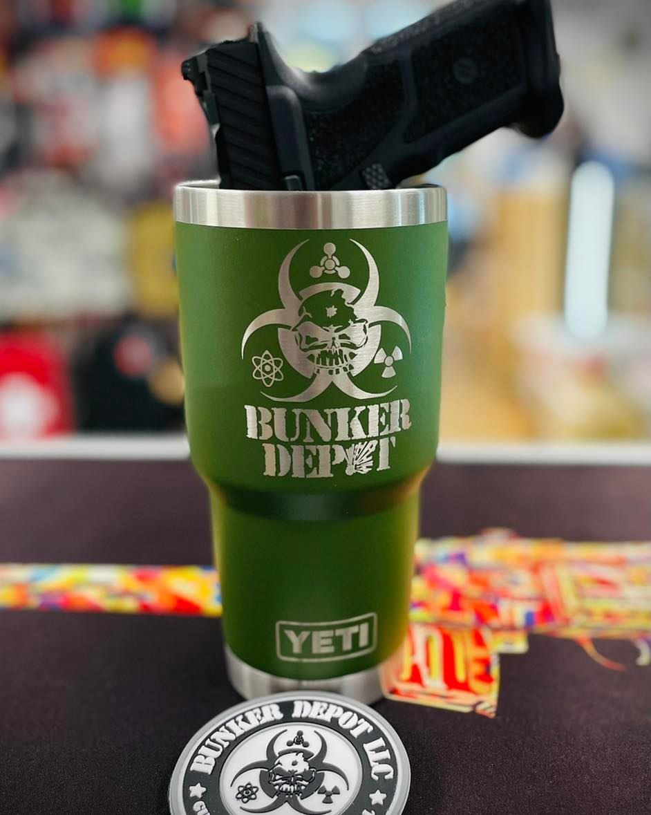 A green yeti cup that says bunker depot on it