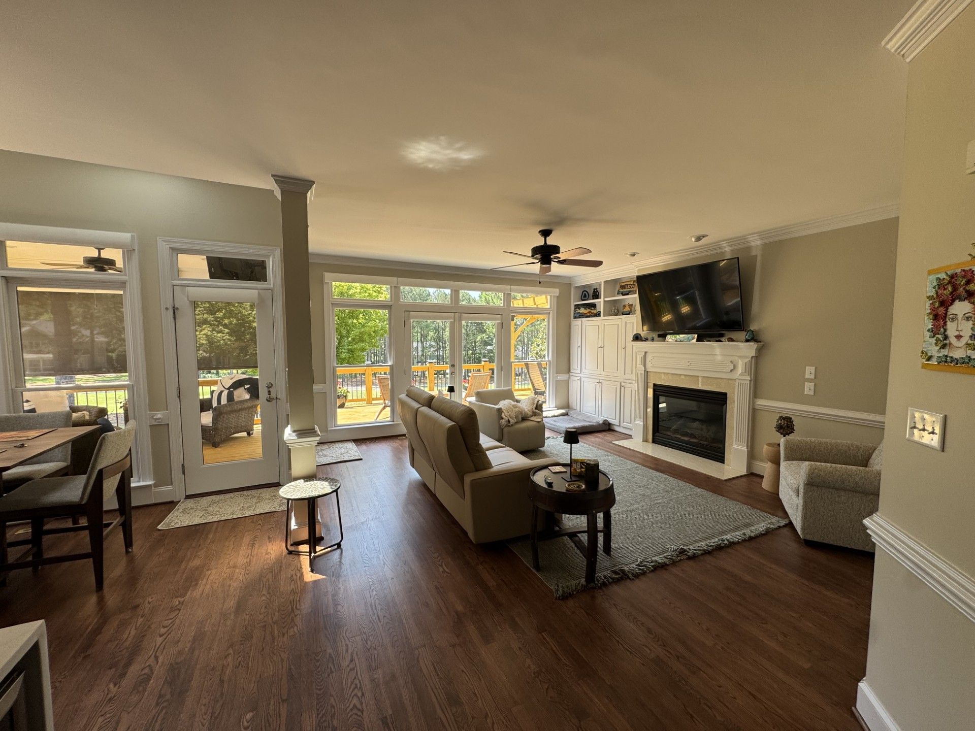 A living room filled with furniture and a fireplace.
