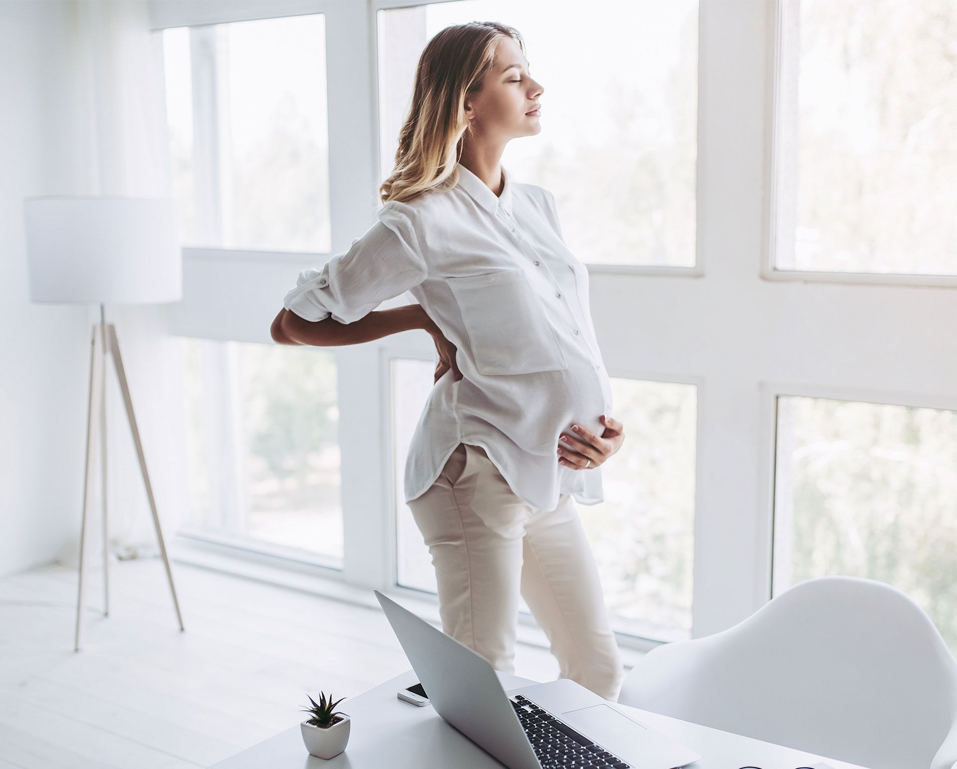 A pregnant woman is having backpain