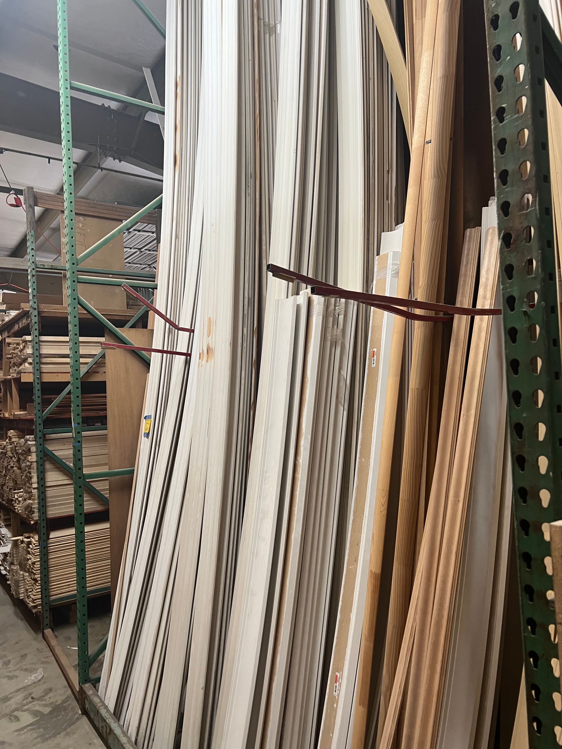 A warehouse filled with lots of pieces of wood.