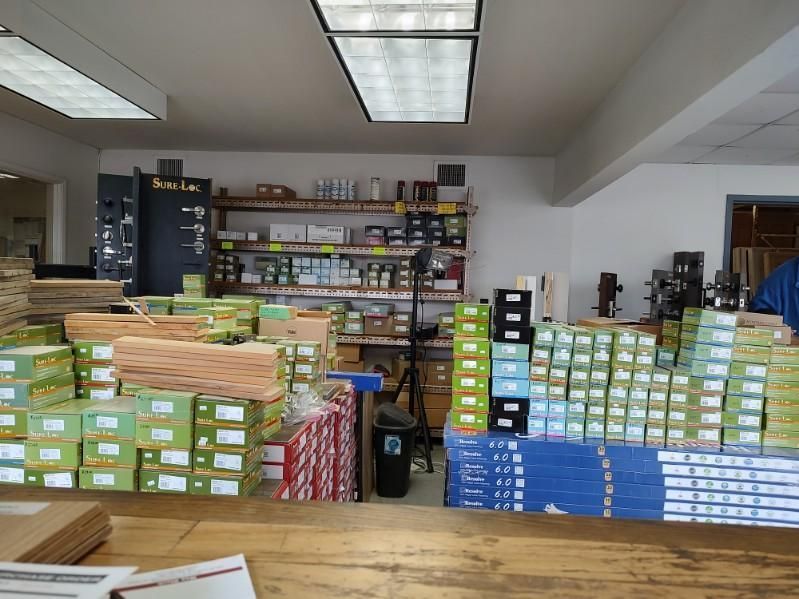 A warehouse filled with lots of boxes and shelves.