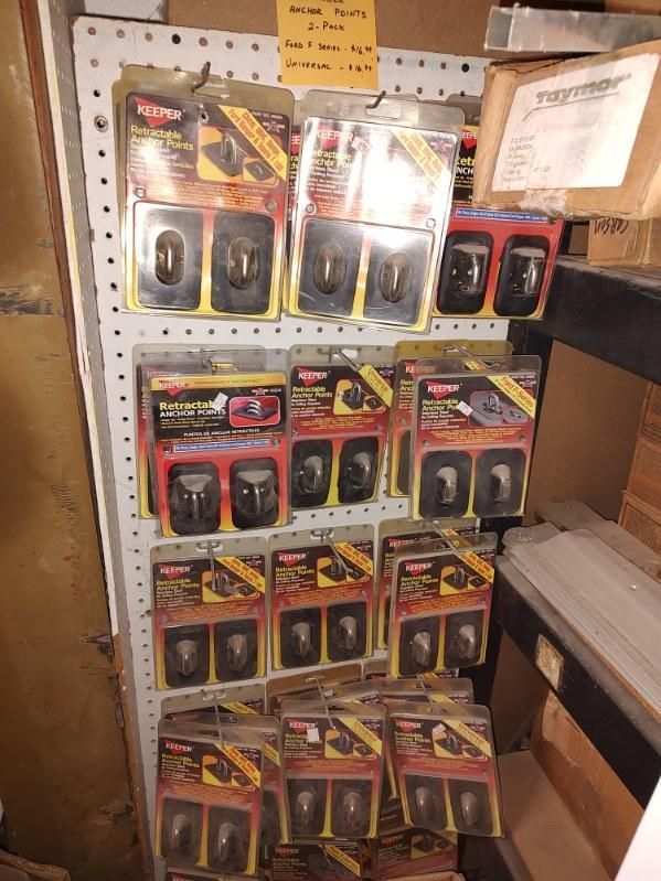 A shelf filled with lots of packages of various items.