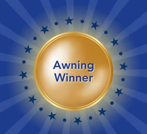 Gold “Awning Winner” badge on a blue background with stars
