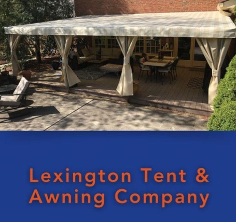 Outdoor patio covered by a beige awning with “Lexington Tent & Awning Company” text below.