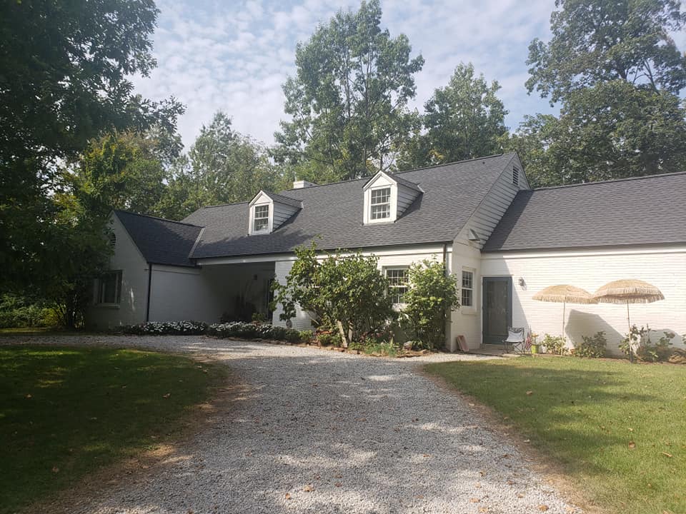 House with dark roofing